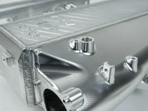 CSF Cooling - Racing & High Performance Division A90 Supra / BMW B58 Charge-Air Cooler Manifold - Thermal Dispersion Black Center